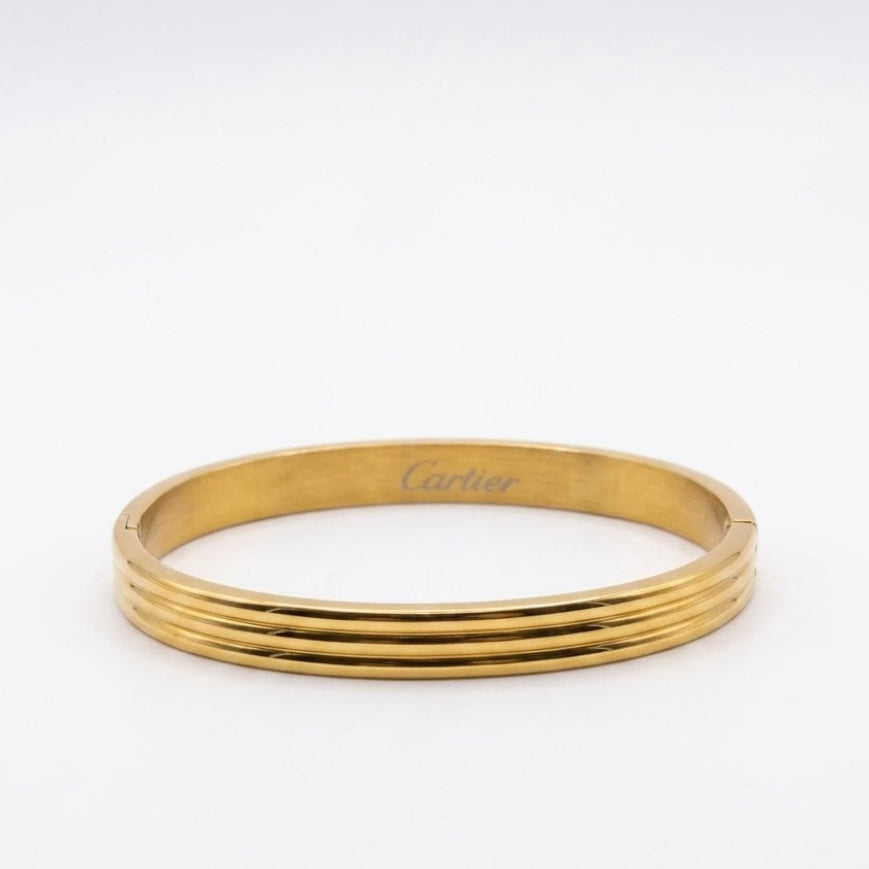 Cartier triple gold bracelet